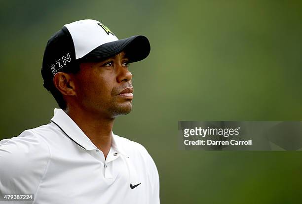 Tiger Woods waits to take his second shot on the seventh hole during the second round of the Greenbrier Classic at the Old White TPC on July 3, 2015...
