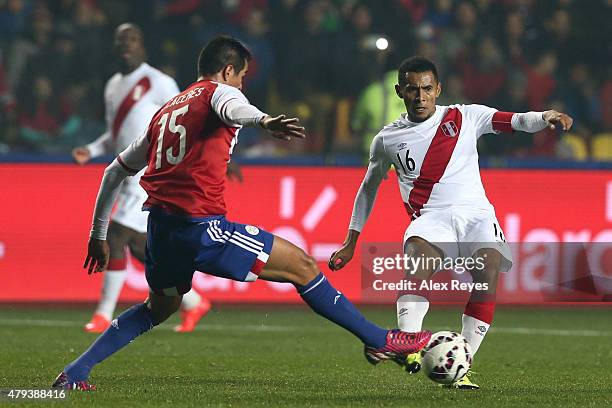Victor Caceres of Paraguay fights for the ball with Carlos Lobaton of Peru during the 2015 Copa America Chile Third Place Playoff match between Peru...