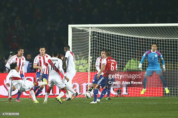 Andre Carrillo of Peru shoots to score the opening goal of his team during the 2015 Copa America Chile Third Place Playoff match between Peru and...