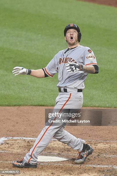 Jake Peavy of the San Francisco Giants reacts after flinging his bat into the stands in the sixth inning during a baseball game against the...