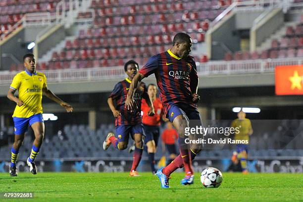 Adama Traore of FC Barcelona scores his team's fourth goal during the UEFA Youth League Quarter FInal match between FC Barcelona U19 and Arsenal U19...