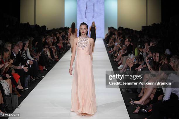 Model showcases designs by Rachel Gilbert on the runway during the Premium Runway 2 show presented by In Style at Melbourne Fashion Festival on March...