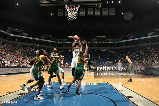 Monica Wright of the Minnesota Lynx shoots against the Seattle Storm on July 3, 2015 at Target Center in Minneapolis, Minnesota. NOTE TO USER: User...