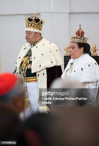 King Tupou VI of Tonga and Queen Nanasipau'u sit on their throne during the official coronation ceremony at the Free Wesleyan Church on July 4, 2015...
