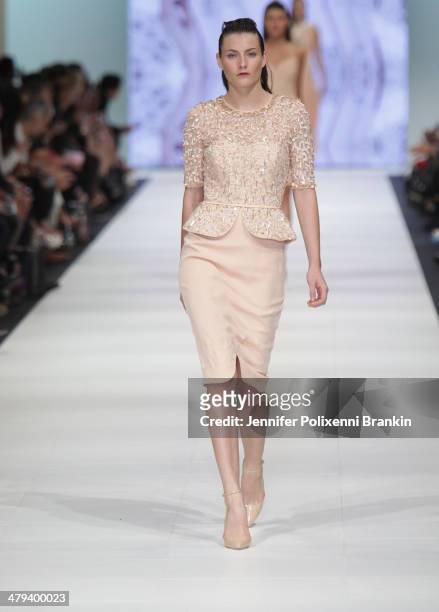 Model showcases designs by Rachel Gilbert on the runway during the Premium Runway 2 show presented by In Style at Melbourne Fashion Festival on March...