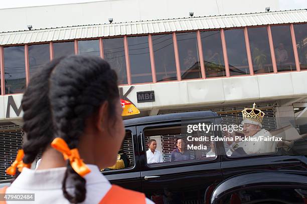 King Tupou VI and Queen Nanasipau'u proceed through the streets to the Royal Palace during the official coronation ceremony on July 4, 2015 in...