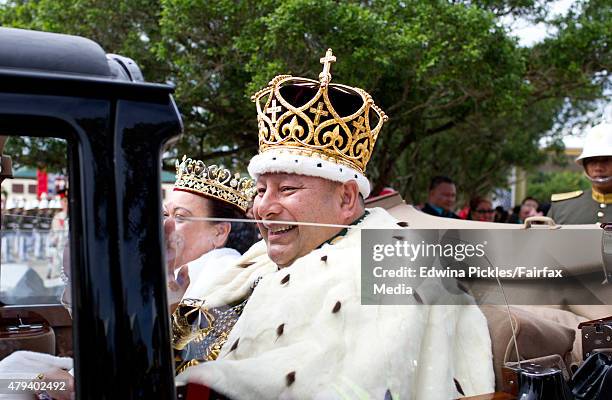 King Tupou VI and Queen Nanasipau'u proceed through the streets to the Royal Palace during the official coronation ceremony on July 4, 2015 in...