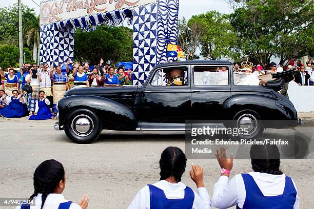 King Tupou VI and Queen Nanasipau'u proceed through the streets to the Royal Palace during the official coronation ceremony on July 4, 2015 in...