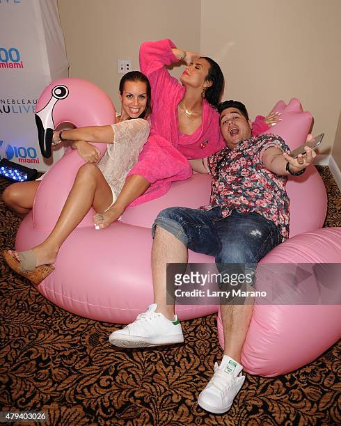 Noa Lindberg, Demi Lovato and DJ Mack pose at the Y-100 cool for the summer pool party held at the Fontainebleau on July 2, 2015 in Miami Beach,...