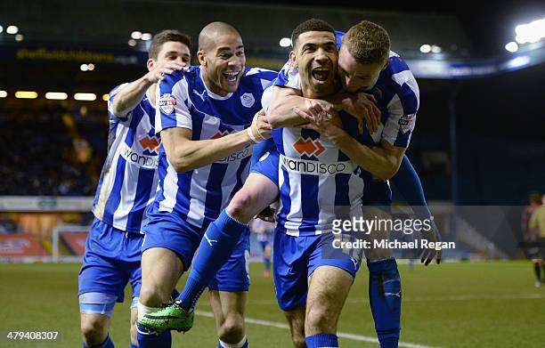 Leon Best of Sheffield Wednesday celebrates scoring to make it 2-0 with team mates during the Sky Bet Championship match between Sheffield Wednesday...