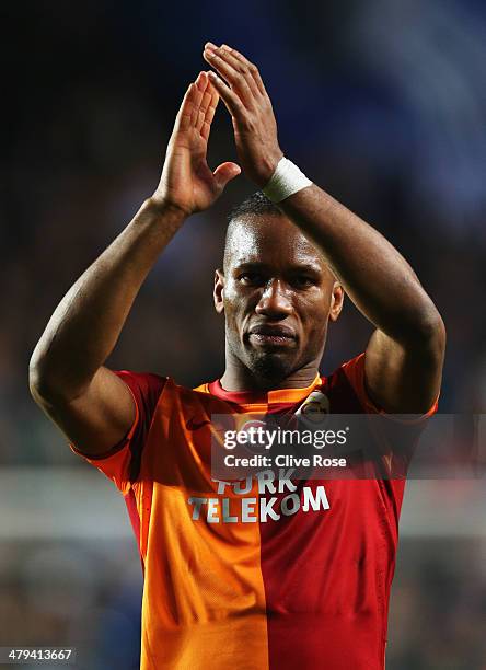 Didier Drogba of Galatasaray applauds the crowd after the UEFA Champions League Round of 16 second leg match between Chelsea and Galatasaray AS at...