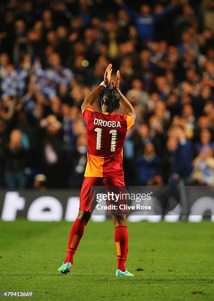 Didier Drogba of Galatasaray applauds the crowd after the UEFA Champions League Round of 16 second leg match between Chelsea and Galatasaray AS at...