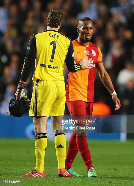 Didier Drogba of Galatasaray shakes hands with Petr Cech of Chelsea after the UEFA Champions League Round of 16 second leg match between Chelsea and...