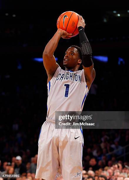 Austin Chatman of the Creighton Bluejays shoots against the Providence Friars during the Championship game of the 2014 Men's Big East Basketball...