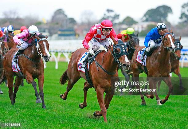 Dwayne Dunn riding Miss Promiscuity wins race 8 the PFD Food Services Sir John Monash Stakes during TAB National Jockeys' Trust Race Day at Caulfield...