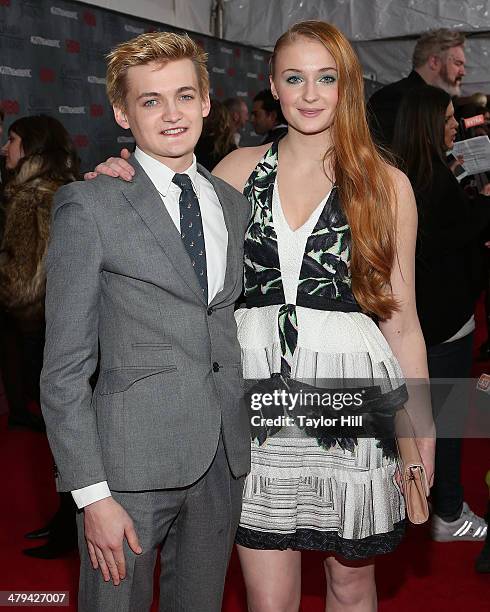 Actor Jack Gleeson and actress Sophie Turner attend the "Game Of Thrones" Season 4 premiere at Avery Fisher Hall, Lincoln Center on March 18, 2014 in...