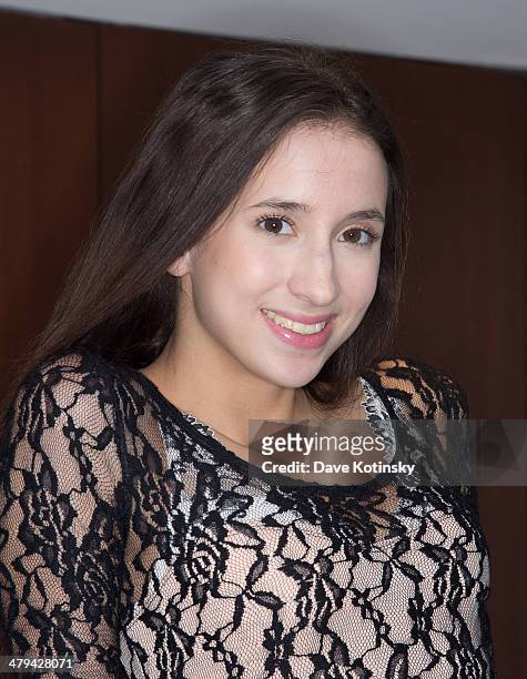 Belle Knox poses for photos on March 18, 2014 in New York City.