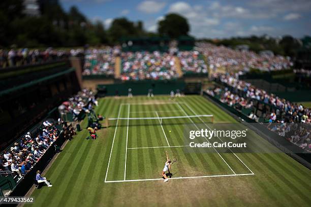 Kristyna Pliskova of the Czech Republic serves against Monica Niculescu of Romania during their Ladies Singles third round match on day 6 of the...