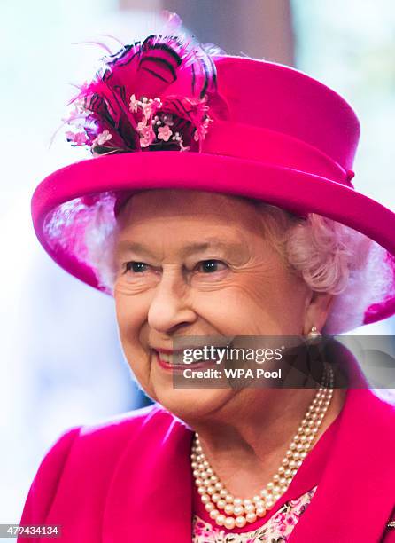 Queen Elizabeth II smiles during a visit to the headquarters of the Royal Auxiliary Air Force's 603 Squadron on July 4, 2015 in Edinburgh, Scotland.