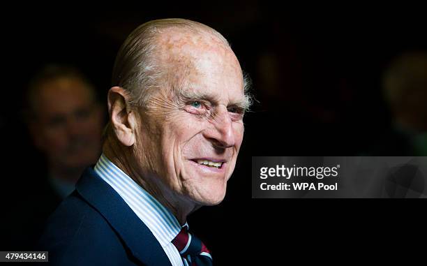 Prince Philip, Duke of Edinburgh smiles during a visit to the headquarters of the Royal Auxiliary Air Force's 603 Squadron on July 4, 2015 in...