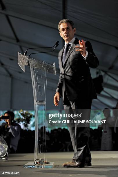 Former French president and president of French right-wing opposition party Les Republicains, Nicolas Sarkozy, delivers a speech on stage during the...