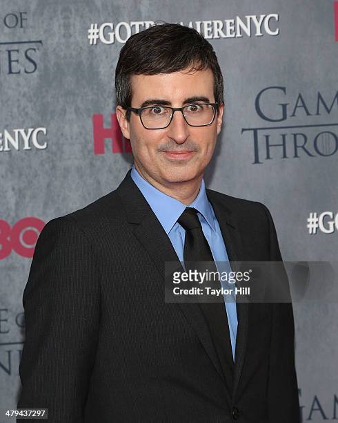 Personality John Oliver attends the "Game Of Thrones" Season 4 premiere at Avery Fisher Hall, Lincoln Center on March 18, 2014 in New York City.