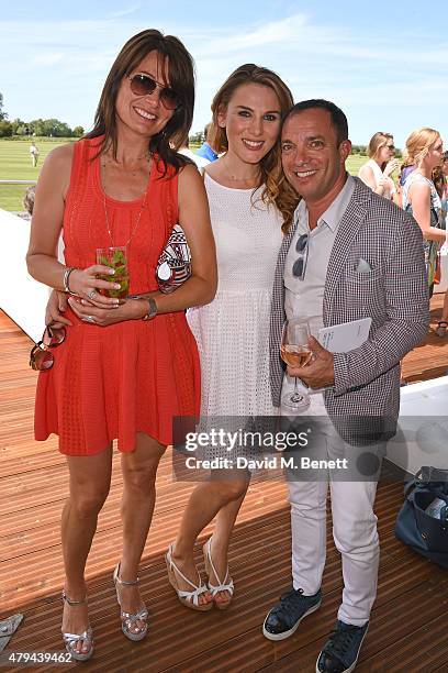 Anne-Marie Boucher, Tonya Meli and Mitch Garber attend the Audi Polo Challenge 2015 at Cambridge County Polo Club on July 3, 2015 in Cambridge,...