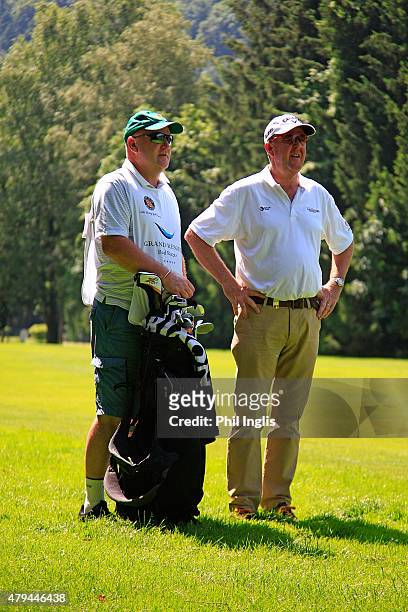 Greg Turner of New Zealand and his caddie John Huggan in action during the second round of the Swiss Seniors Open played at Golf Club Bad Ragaz on...