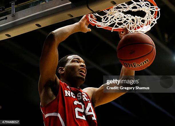 Warren of the North Carolina State Wolfpack dunks against the Xavier Musketeers in the second half during the first round of the 2014 NCAA Men's...