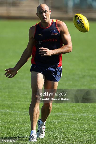 James Podsiadly kicks the ball during an Adelaide Crows AFL training session at AAMI Stadium on March 19, 2014 in Adelaide, Australia.