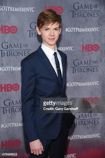 Thomas Brodie-Sangster attends the "Game Of Thrones" Season 4 premiere at Avery Fisher Hall, Lincoln Center on March 18, 2014 in New York City.