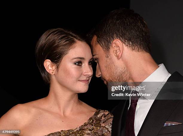 Actors Shailene Woodley and Theo James arrive at the premiere of Summit Entertainment's "Divergent" at the Regency Bruin Theatre on March 18, 2014 in...