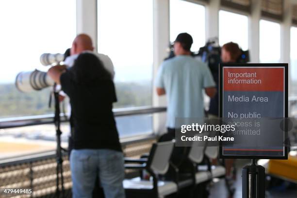 Media keep a watch on the Aeronexus Corporation's - Boeing 767 used by the Rolling Stones at Perth International Airport on March 19, 2014 in Perth,...