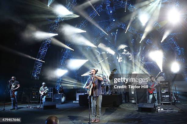 Boyd Tinsley, Tim Reynolds, Dave Matthews, Carter Beauford, and Stefan Lessard of Dave Matthews Band perform at Saratoga Performing Arts Center on...