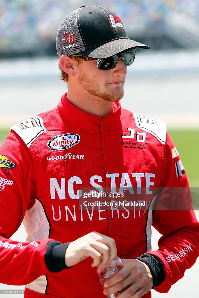 Harrison Rhodes Racing Harrison Rhodes, driver of the Flex Seal Colors Chevrolet, stands on ...