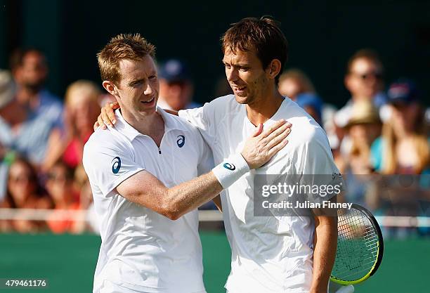 Jonathan Marray of Great Britain and Frederik Nielsen of Denmark celebrate during the Gentlemens Doubles Second Round match against Juan-Sebastian...