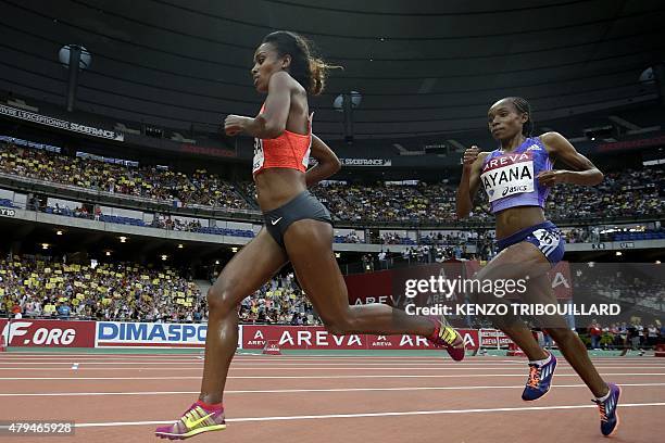 Ethiopia's Genzebe Dibaba advances ahead of Ethiopia's Almaz Ayana during the women's 5000m during the IAAF Diamond League athletics meeting at the...