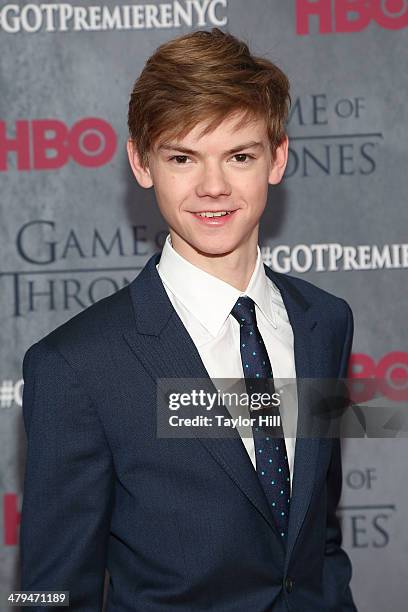 Actor Thomas Brodie-Sangster attends the "Game Of Thrones" Season 4 premiere at Avery Fisher Hall, Lincoln Center on March 18, 2014 in New York City.