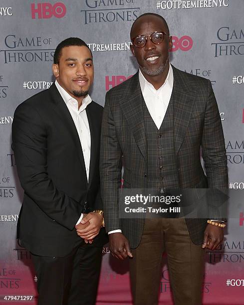 Karim Anderson and Michael Kenneth Williams attend the "Game Of Thrones" Season 4 premiere at Avery Fisher Hall, Lincoln Center on March 18, 2014 in...