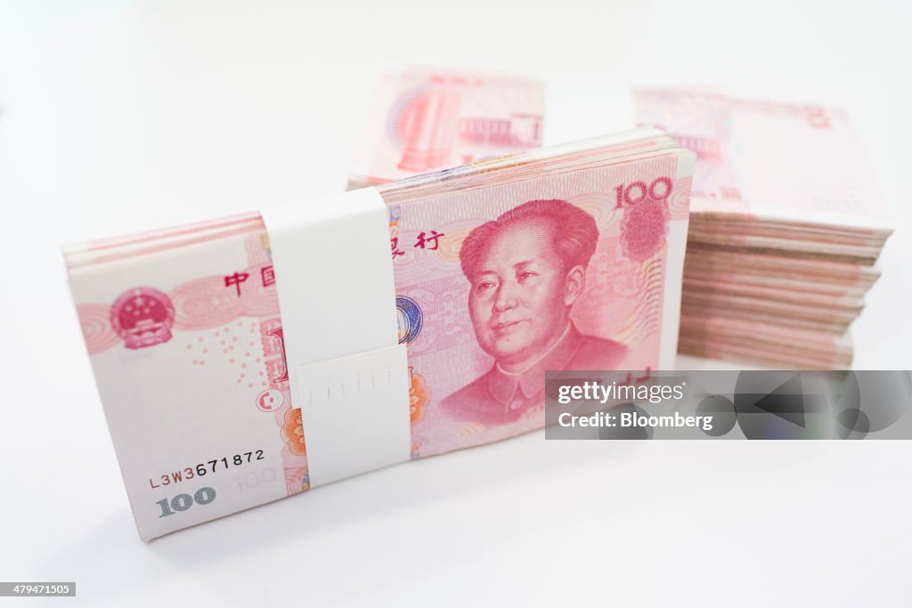 Renminbi Notes At a Standard Chartered Plc Branch As Currency to Start Direct Trading With Kiwi Dollar