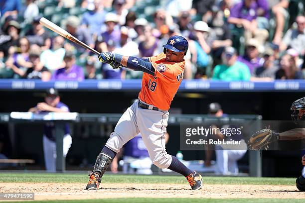 Luis Valbuena of the Houston Astros bats during the game against the Colorado Rockies at Coors Field on June 18, 2015 in Denver, Colorado. The Astros...