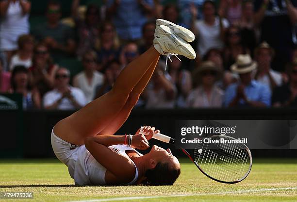 Jelena Jankovic of Serbia celebrates match point in her Ladies Singles third Round match against Petra Kvitova of Czech Republic during day six of...