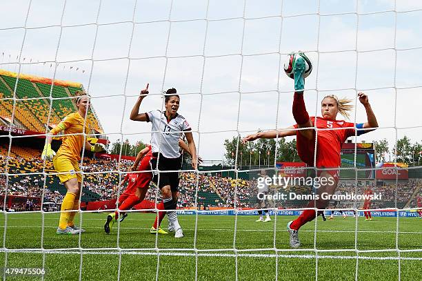 Steph Houghton of England clears the ball during the FIFA Women's World Cup Canada 2015 Third Place Play-off match between Germany and England at...