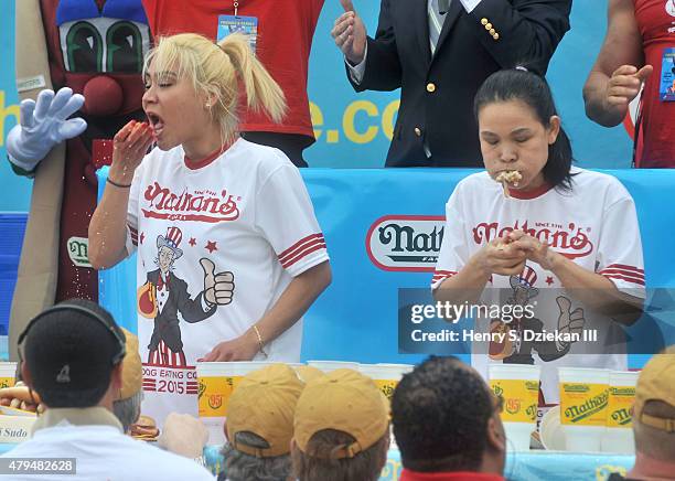 Miki Sudo and Sonya Thomas attends 2015 Nathan's Famous 4th Of July International Hot Dog Eating Contest at Coney Island on July 4, 2015 in New York...