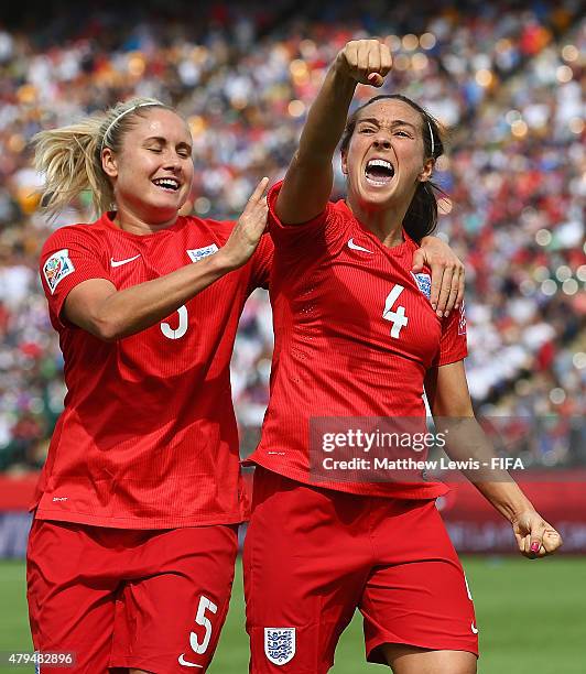 Fara Williams of England celebrates her goal from the penalty spot with Steph Houghton during the FIFA Women's World Cup 2015 Third Place Play-off...