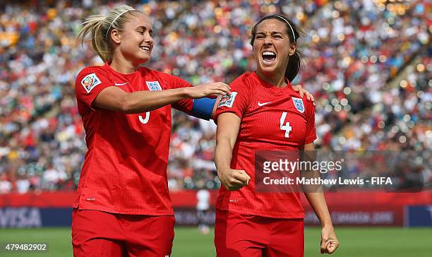Fara Williams of England celebrates her goal from the penalty spot with Steph Houghton during the FIFA Women's World Cup 2015 Third Place Play-off...