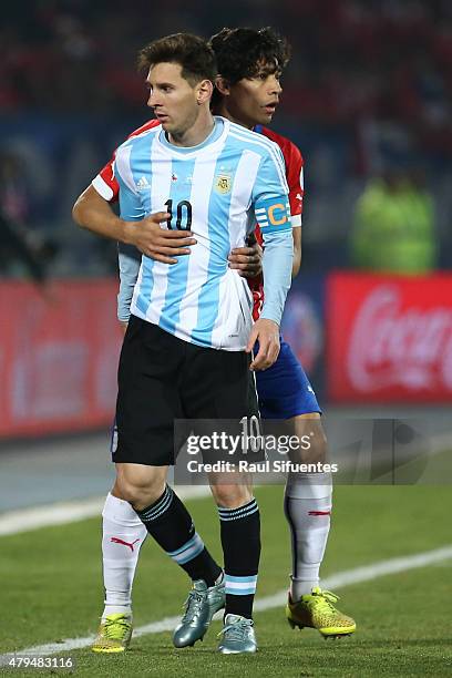 Matias Fernandez of Chile and Lionel Messi of Argentina during the 2015 Copa America Chile Final match between Chile and Argentina at Nacional...