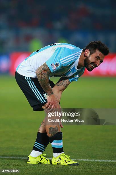 Ezequiel Lavezzi of Argentina reacts after being injuried during the 2015 Copa America Chile Final match between Chile and Argentina at Nacional...