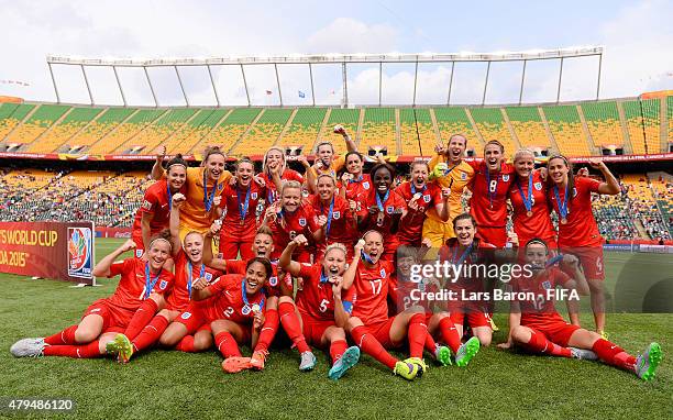 Players of England celebrate after winning the FIFA Women's World Cup 2015 Third Place Play-off match between Germany and England at Commonwealth...