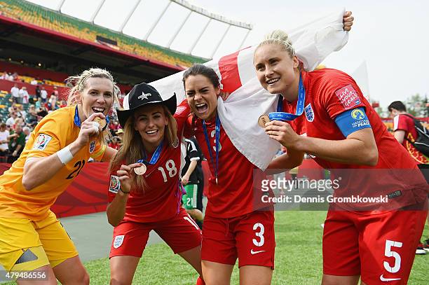 Carly Telford, Toni Duggan, Claire Rafferty and Steph Houghton of England celebrate their third place in the FIFA Women's World Cup Canada 2015 Third...